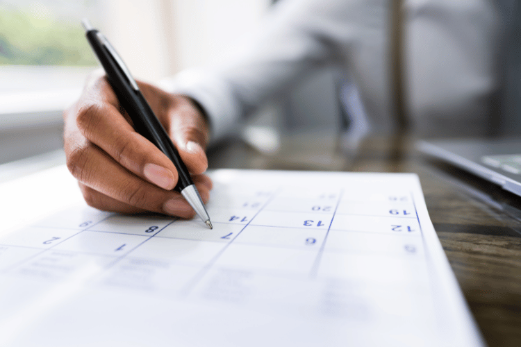 Closeup of a man setting a deadline