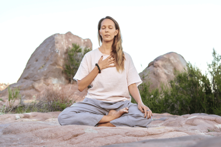 Woman Meditating with Her Eyes Closed